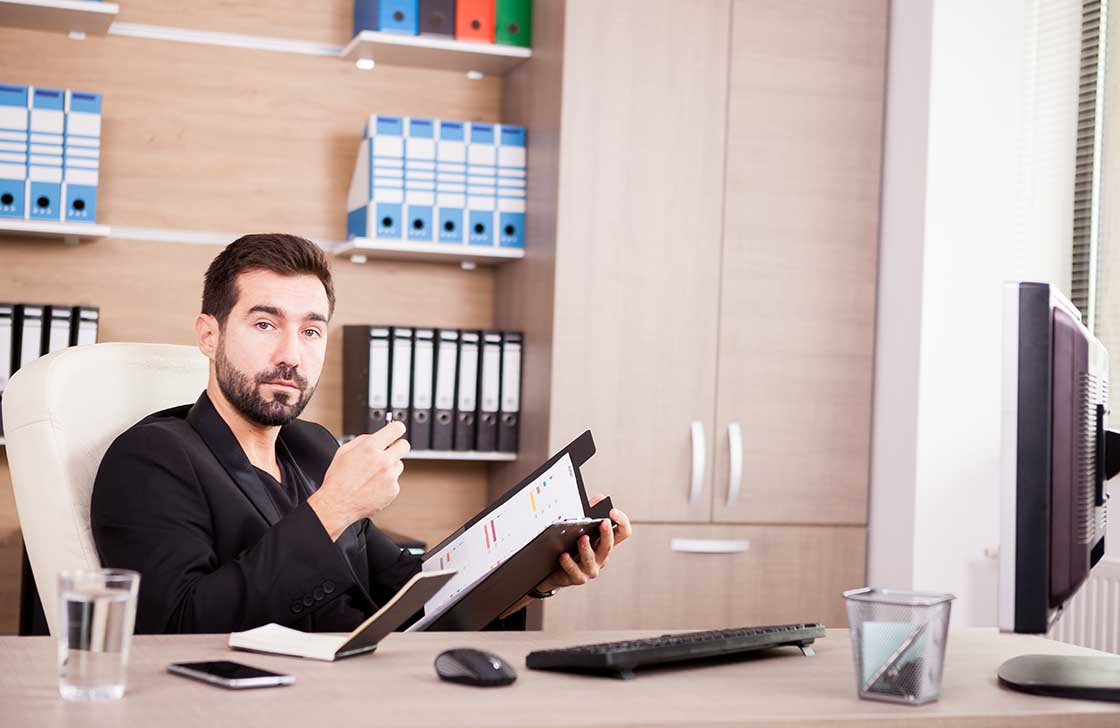 Portrait of accountants working in his office in professional environment