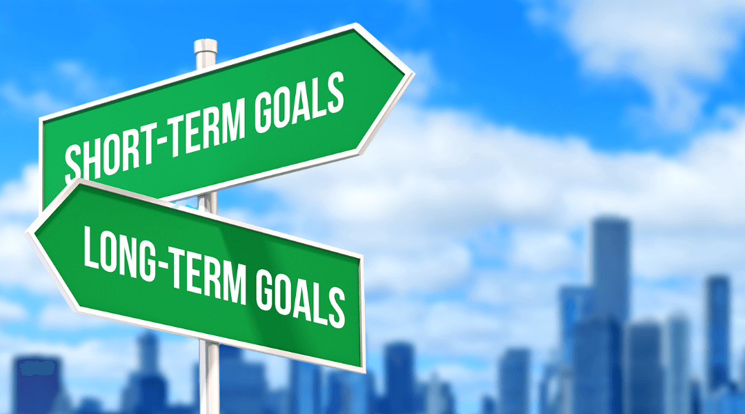 Two green signs pointing to different goals, showing choices ahead.