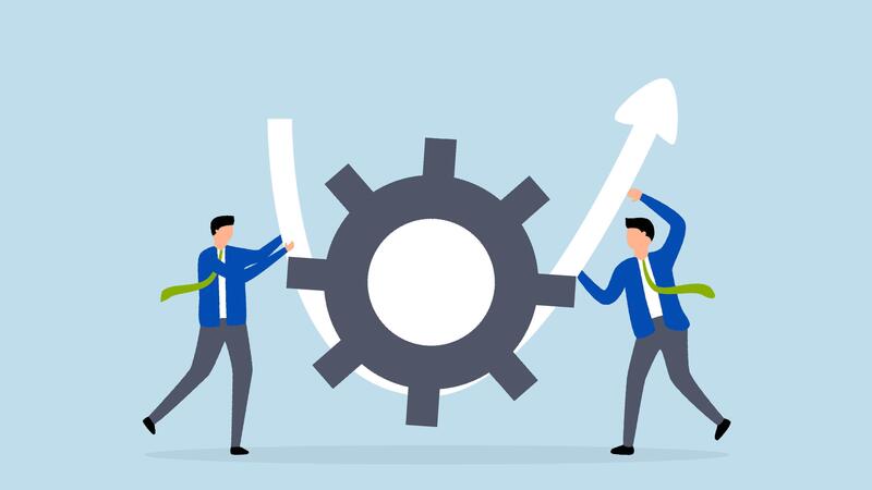Business people holding gears and arrows to show growth and progress at work.