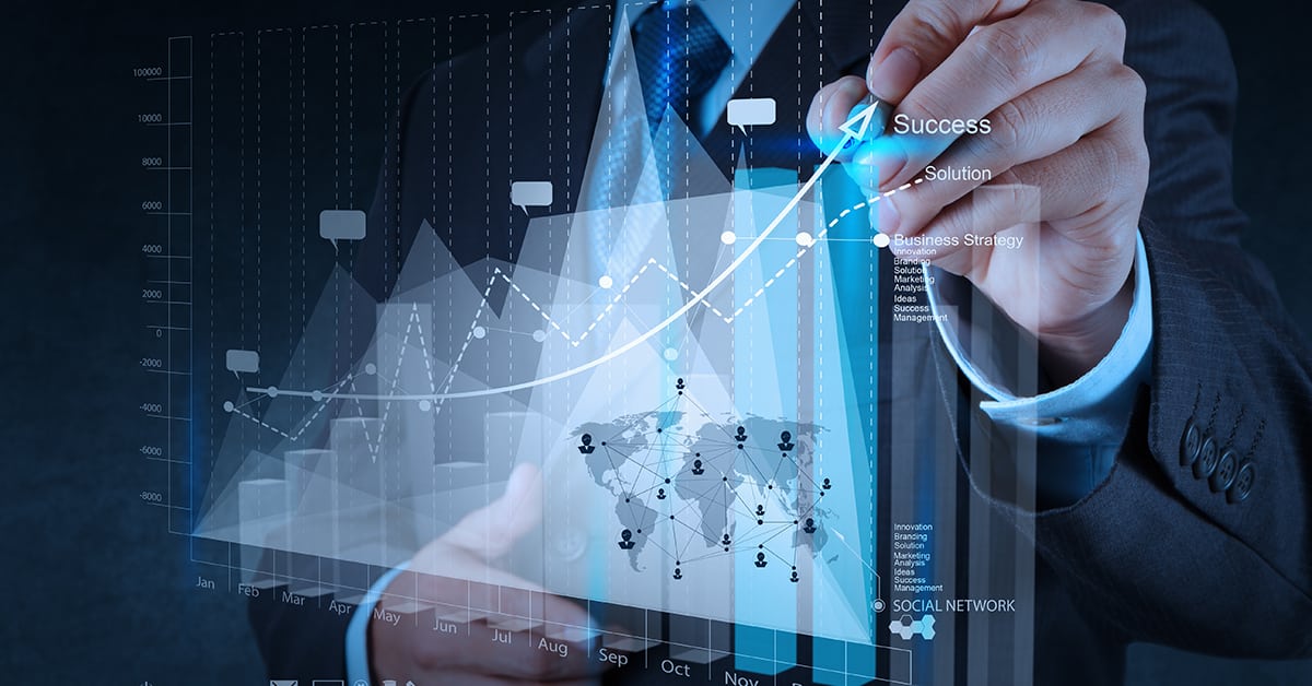 A businessman looks at data and makes charts on a screen, focusing on CFO crisis management.